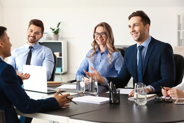 Human resources commission interviewing man in office