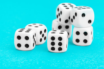 Gaming dices on blue background. Game concept.