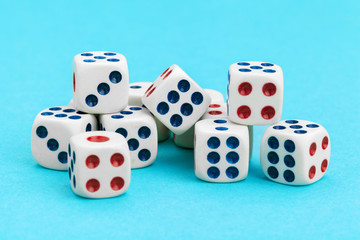 Gaming dices on blue background. Game concept.