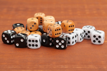 Dice on a wooden table. Concept for business risk.