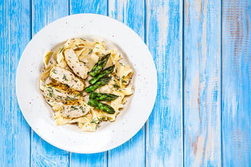 Pasta, white sauce and vegetables