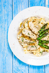 Pasta, white sauce and vegetables