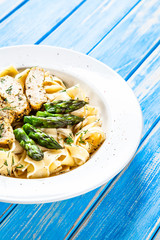 Pasta, white sauce and vegetables