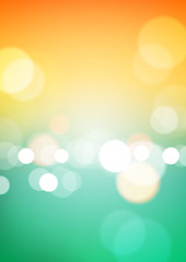 Abstract bokeh light on orange green background