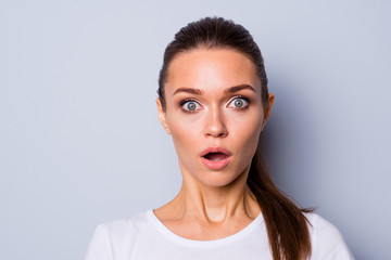 Close up photo beautiful amazing pretty she her lady big great eyes full fear staring stupor open mouth unexpected news epic fail lost loser wear casual white t-shirt isolated grey background