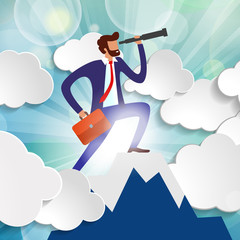 effective manager looks into telescope into distance trying to predict future. businessman standing on top of mountain among clouds in rays of sunlight. business vision concept