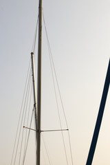 Vessel's mast with sky in the background