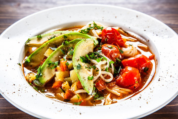 Ramen - soup with noodles and vegetables