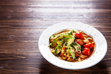 Ramen - soup with noodles and vegetables