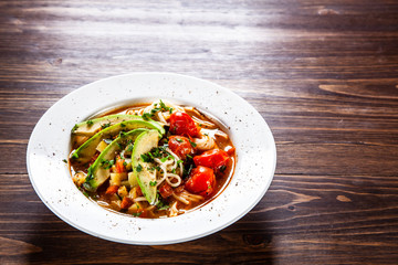 Ramen - soup with noodles and vegetables
