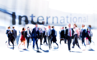 Business people rushing in the City. Beautiful abstract blurred image representing modern business life, success, moving concept.