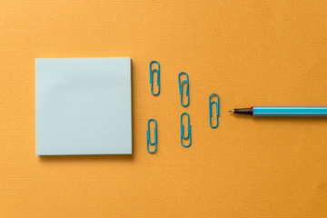Colored blank sticky note clips binders gathered pen trendy cool background