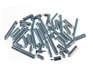 An assortment of iron standoffs or spacers