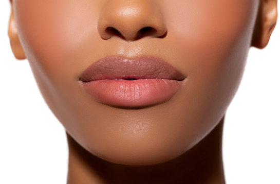 Sexy lips. Close-up female lips, mouth, perfect healthy lips of a dark-skinned girl, transparent gloss of lipstick on the lips. plump lip.  - Image      