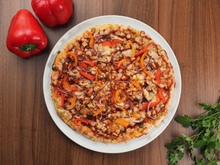Pizza with meat, pepper and onions