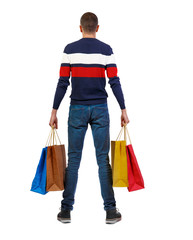 back view of man  with shopping bags