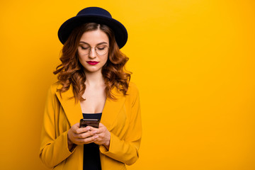 Close up photo beautiful she her lady concentrated arms hands telephone check instagram followers...