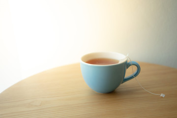 cup of tea on wooden table