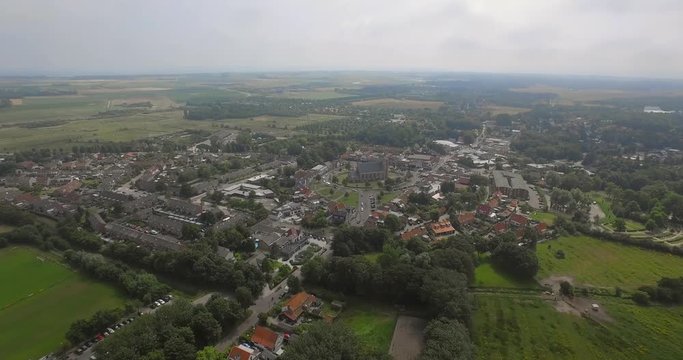 The small touristic town Renesse in the Netherlands during a light overcast day in summer. Aerial shot.