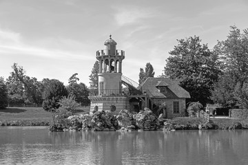 Obraz premium Queen’s Hamlet, small village around Big Lake at Versailles Royal palace next to Small Trianon
