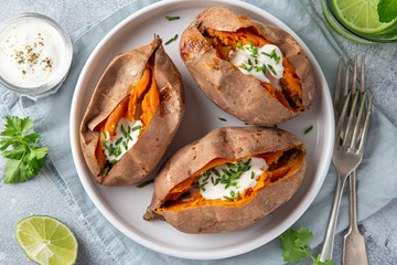 baked sweet potato with yogurt sause and chives