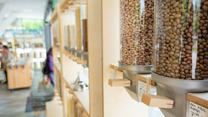 Dispensers for bulk shopping with various healthy ingredients encouraging zero waste lifestyle.