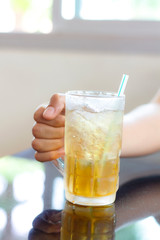 Yellow water in herbal glass