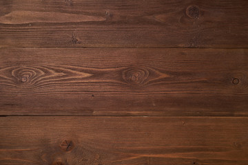 Dark brown wooden background with pine wood, structure of wood with knots