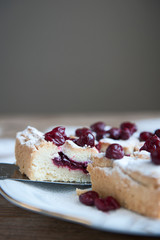 Cherry pie with heart shaped on the rustic background