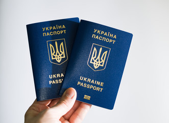 passport of Ukraine in hand