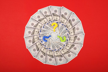 Question mark on mandala kaleidoscope from money.