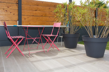 pink metal chair table on the terrace