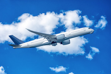 Fototapeta na wymiar Drawing of a jet in blue cloudy sky.