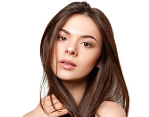 Fototapeta premium beauty portrait of a young beautiful brunette girl with brown eyes and straight long flowing hair isolated on white background