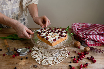 Cheery pie with heart shapes. Woman decoration homemade  cake.