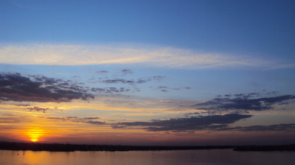 Por do sol na cidade de Porto Alegre, estado do Rio Grande do Sul, pais Brasil.