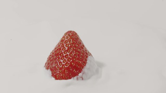 Straberry and milk, slow motion