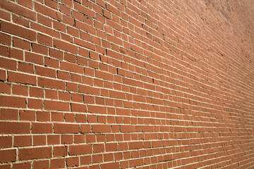 The background of the wall of red brick with perspective Backgrounds textures for graphic design...