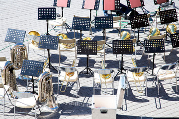 Top view of the chairs music stands brass band instruments. Preparation of the festival of military bands Spasskaya tower, Moscow