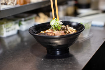 cooking preparing and serving japanese ramen
