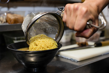 preparing and cooking japanese ramen