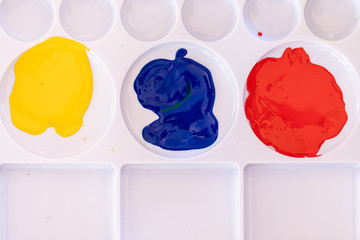 Close up of different color oil paint, Patterns or backgrounds of various colors, colors on the fabric.