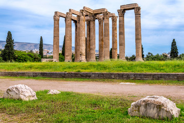 Athens, Attica / Greece.The Temple of Olympian Zeus also known as the Olympieion or Columns of the Olympian Zeus at the center of Athens city. Sunny day, blue cloudy sky, nobody