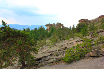 panorama with rocky mountains and cloudy sky