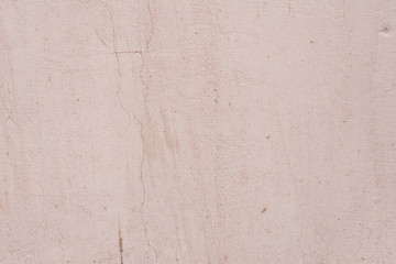 Texture, wall, concrete, it can be used as a background. Wall fragment with scratches and cracks