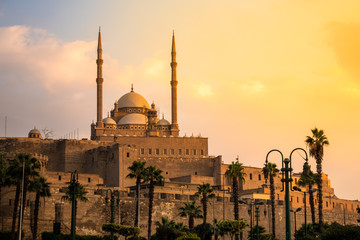 The Mosque of Muhammad Ali in Cairo Egypt at sunset - obrazy, fototapety, plakaty
