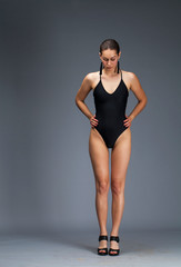 Full portrait of sexy lady in black underwear