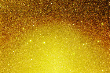 Gold texture. Gold holiday background. Luxury brilliant shine