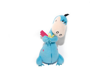 Soft toy dragon isolated on white background. Kids toys.