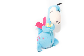Soft toy dragon isolated on white background. Kids toys.